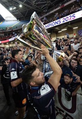 240525 - Northampton Saints v Union Bordeaux-Begles, EPCR Champions Cup Final - Matthieu Jalibert of Union Bordeaux-Begles celebrates with the trophy and fans as they win the Investec Champions Cup