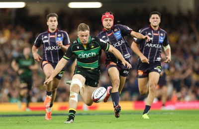 240525 - Northampton Saints v Union Bordeaux-Begles, EPCR Champions Cup Final - Tom Litchfield of Northampton Saints beats Louis Bielle-Biarrey of Union Bordeaux-Begles to the ball