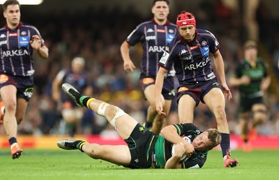 240525 - Northampton Saints v Union Bordeaux-Begles, EPCR Champions Cup Final - Tom Litchfield of Northampton Saints beats Louis Bielle-Biarrey of Union Bordeaux-Begles to the ball