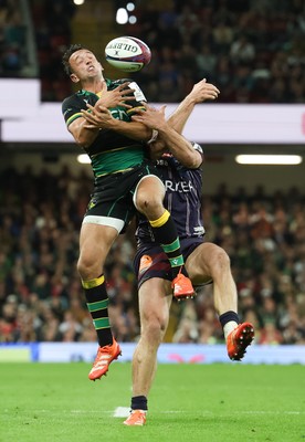 240525 - Northampton Saints v Union Bordeaux-Begles, EPCR Champions Cup Final - Alex Mitchell of Northampton Saints and Damian Penaud of Union Bordeaux-Begles compete for the ball