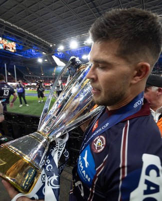 240525 - Northampton Saints v Union Bordeaux-Begles, EPCR Champions Cup Final - Matthieu Jalibert of Union Bordeaux-Begles celebrates with the trophy