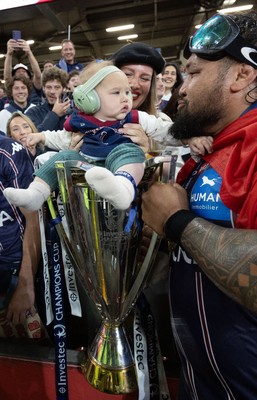240525 - Northampton Saints v Union Bordeaux-Begles, EPCR Champions Cup Final - Ben Tameifuna of Union Bordeaux-Begles celebrates with the trophy and supporters