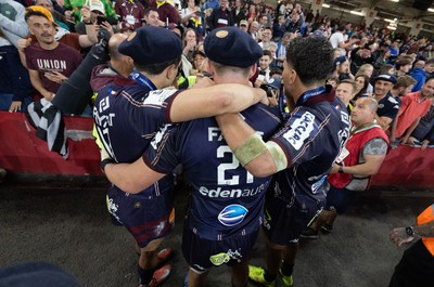 240525 - Northampton Saints v Union Bordeaux-Begles, EPCR Champions Cup Final - Union Bordeaux-Begles players celebrate with the trophy and fans
