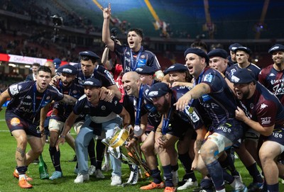 240525 - Northampton Saints v Union Bordeaux-Begles, EPCR Champions Cup Final - Union Bordeaux-Begles celebrate with the trophy