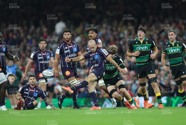 240525 - Northampton Saints v Union Bordeaux-Begles, EPCR Champions Cup Final - Maxime Lucu of Union Bordeaux-Begles kicks ahead