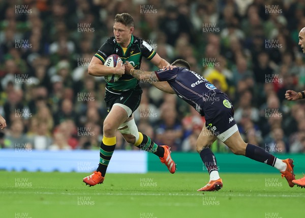 240525 - Northampton Saints v Union Bordeaux-Begles, EPCR Champions Cup Final - Fraser Dingwall of Northampton Saints takes on Matthieu Jalibert of Union Bordeaux-Begles