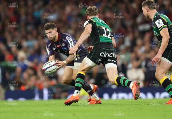 240525 - Northampton Saints v Union Bordeaux-Begles, EPCR Champions Cup Final - Matthieu Jalibert of Union Bordeaux-Begles is tackled as he goes to kick