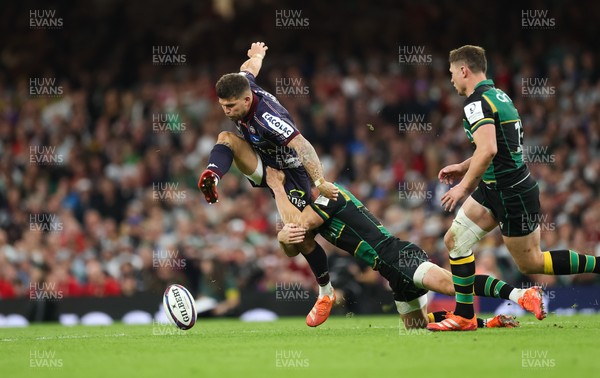 240525 - Northampton Saints v Union Bordeaux-Begles, EPCR Champions Cup Final - Matthieu Jalibert of Union Bordeaux-Begles is tackled as he goes to kick