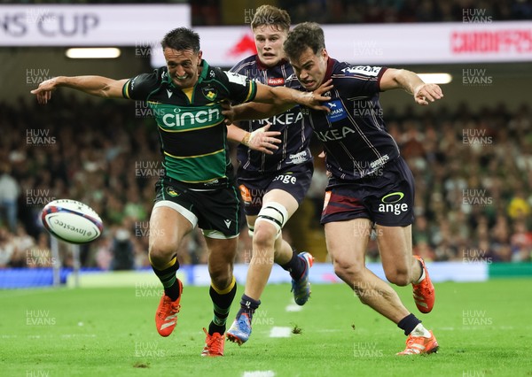 240525 - Northampton Saints v Union Bordeaux-Begles, EPCR Champions Cup Final - Alex Mitchell of Northampton Saints and Damian Penaud of Union Bordeaux-Begles compete for the ball
