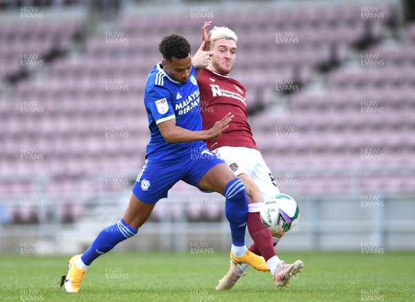 050920 - Northampton Town v Cardiff City - Carabao Cup First Round South - Josh Murphy of Cardiff City is tackled by Ryan Watson of Northampton Town