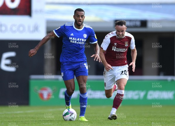 050920 - Northampton Town v Cardiff City - Carabao Cup First Round South - Curtis Nelson of Cardiff City gets away from Matt Warburton of Northampton Town