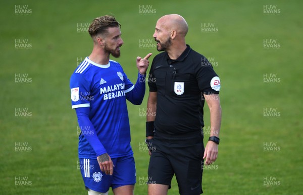 050920 - Northampton Town v Cardiff City - Carabao Cup First Round South - Referee Darren Drysdale talks to Joe Bennett of Cardiff City