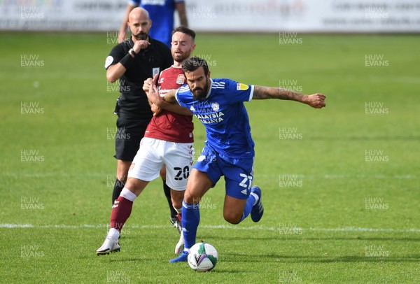 050920 - Northampton Town v Cardiff City - Carabao Cup First Round South - Marlon Pack of Cardiff City is tackled by Matt Warburton of Northampton Town