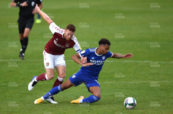 050920 - Northampton Town v Cardiff City - Carabao Cup First Round South - Josh Murphy of Cardiff City is tackled by Cian Bolger of Northampton Town
