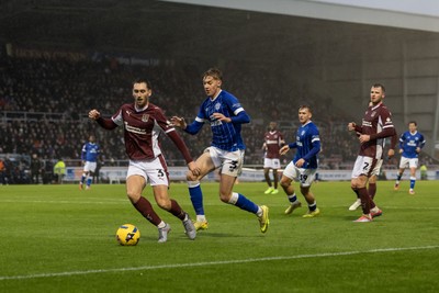 221125 - Northampton Town v Cardiff City - Sky Bet League 1 - Conor McCarthy of Northampton Town and Joel Bagan of Cardiff City