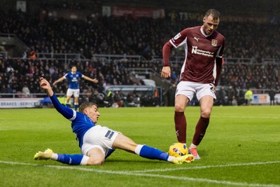 221125 - Northampton Town v Cardiff City - Sky Bet League 1 - Joel Bagan of Cardiff City tackles Terry Taylor of Northampton Town