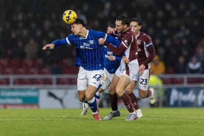 221125 - Northampton Town v Cardiff City - Sky Bet League 1 - Yousef Salech of Cardiff City wins the ball from Conor McCarthy of Northampton Town