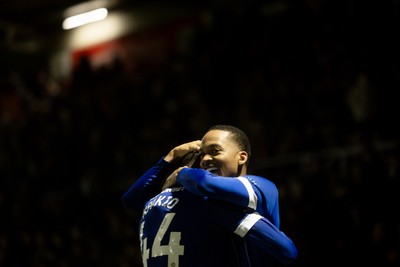221125 - Northampton Town v Cardiff City - Sky Bet League 1 - Chris Willock of Cardiff City celebrates scoring his sides third goal with Ronan Kpakio of Cardiff City