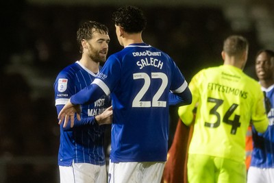 221125 - Northampton Town v Cardiff City - Sky Bet League 1 - Calum Chambers of Cardiff City celebrates his sides victory with Yousef Salech of Cardiff City