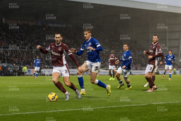221125 - Northampton Town v Cardiff City - Sky Bet League 1 - Conor McCarthy of Northampton Town and Joel Bagan of Cardiff City