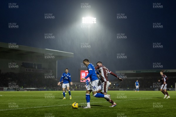 221125 - Northampton Town v Cardiff City - Sky Bet League 1 - Chris Willock of Cardiff City wins the ball from Jack Burroughs of Northampton Town