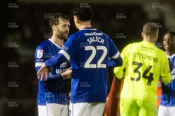 221125 - Northampton Town v Cardiff City - Sky Bet League 1 - Calum Chambers of Cardiff City celebrates his sides victory with Yousef Salech of Cardiff City