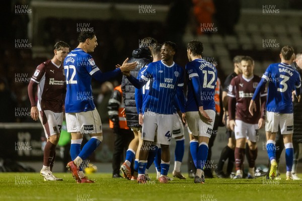 221125 - Northampton Town v Cardiff City - Sky Bet League 1 - Ronan Kpakio of Cardiff City celebrates his sides victory with Yousef Salech of Cardiff City