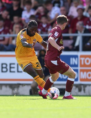 050926 - Northampton Town v Newport County, EFL Sky Bet League 2 - Yahya Bamba of Newport County takes on James Maxwell of Northampton Town