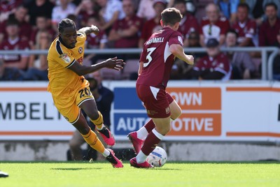 050926 - Northampton Town v Newport County, EFL Sky Bet League 2 - Yahya Bamba of Newport County takes on James Maxwell of Northampton Town