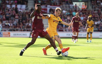 050926 - Northampton Town v Newport County, EFL Sky Bet League 2 - Tyrese Fornah of Northampton Town and Matty Jacob of Newport County compete for the ball