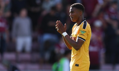 050926 - Northampton Town v Newport County, EFL Sky Bet League 2 - Tanatswa Nyakuhwa of Newport County applauds the fans at the end of the match