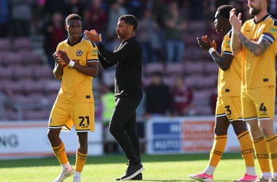 050926 - Northampton Town v Newport County, EFL Sky Bet League 2 - Newport County head coach Hayden Mullins applauds the fans at the end of the match