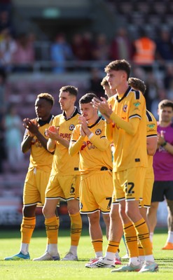 050926 - Northampton Town v Newport County, EFL Sky Bet League 2 - Newport County players applaud the fans at the end of the match