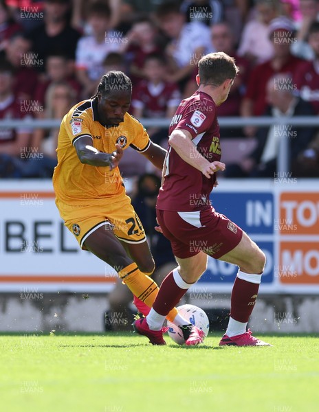 050926 - Northampton Town v Newport County, EFL Sky Bet League 2 - Yahya Bamba of Newport County takes on James Maxwell of Northampton Town