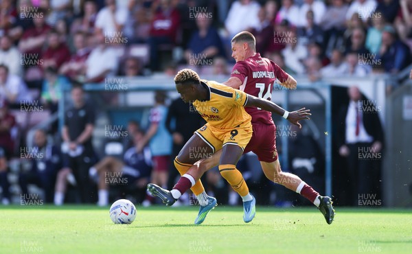 050926 - Northampton Town v Newport County, EFL Sky Bet League 2 - Shaquille Gwengwe of Newport County is challenged by Joe Wormleighton of Northampton Town