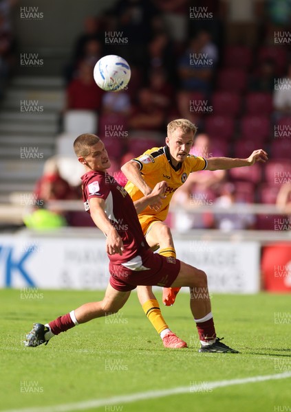 050926 - Northampton Town v Newport County, EFL Sky Bet League 2 - Matty Jacob of Newport County plays the ball past Joe Wormleighton of Northampton Town