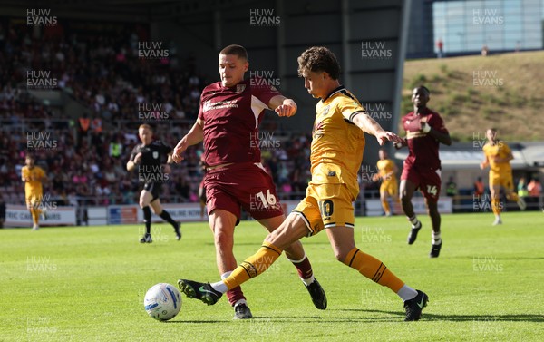 050926 - Northampton Town v Newport County, EFL Sky Bet League 2 - Harrison Biggins of Newport County is challenged by Joe Wormleighton of Northampton Town