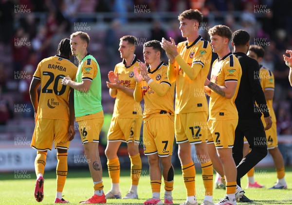 050926 - Northampton Town v Newport County, EFL Sky Bet League 2 - Newport County players applaud the fans at the end of the match