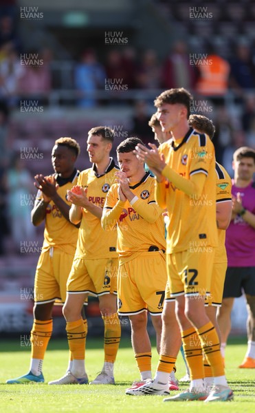 050926 - Northampton Town v Newport County, EFL Sky Bet League 2 - Newport County players applaud the fans at the end of the match