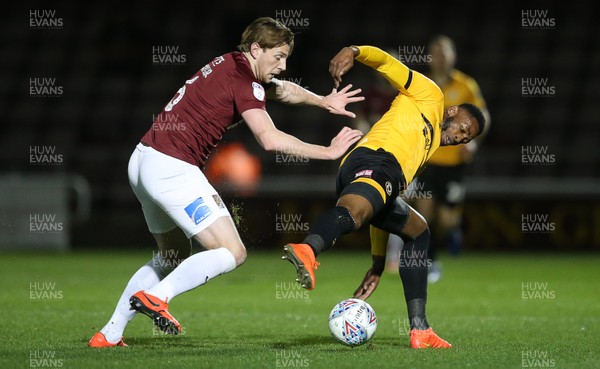 120319 - Northampton Town v Newport County - SkyBet League Two - Jamille Matt of Newport County is challenged by Ash Taylor of Northampton