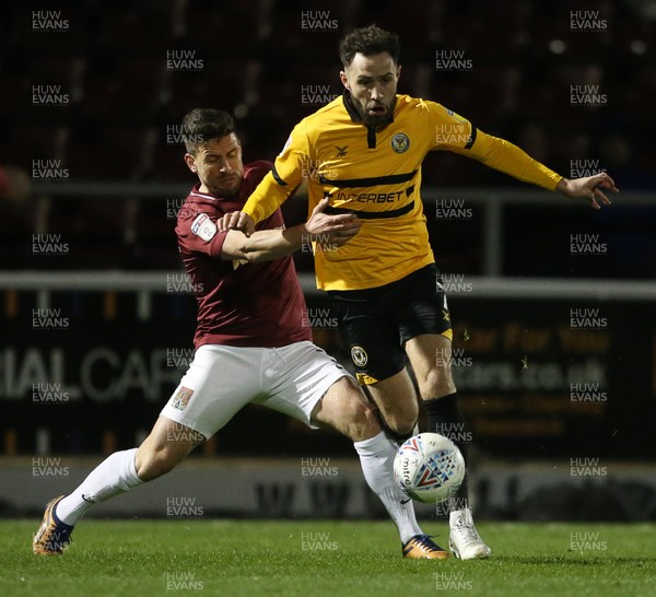 120319 - Northampton Town v Newport County - SkyBet League Two - Robbie Willmott of Newport County is tackled by David Buchanan of Northampton