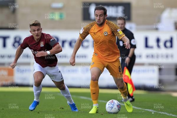 140919 - Northampton Town v Newport County, Sky Bet League 2 - Matthew Dolan of Newport County (right) in action with Sam Hoskins of Northampton Town