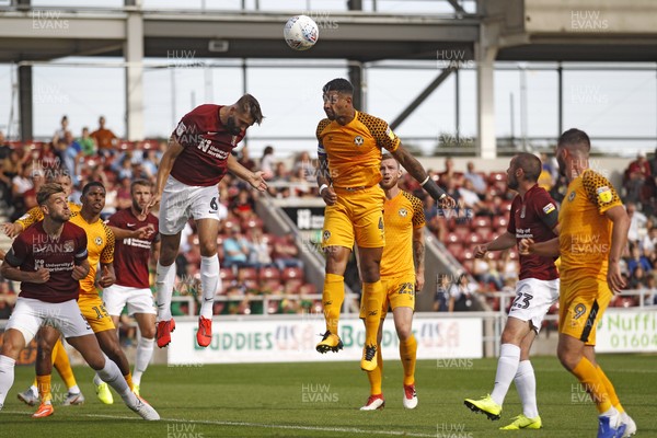 140919 - Northampton Town v Newport County, Sky Bet League 2 - Joss Labadie of Newport County (right) heads at goal