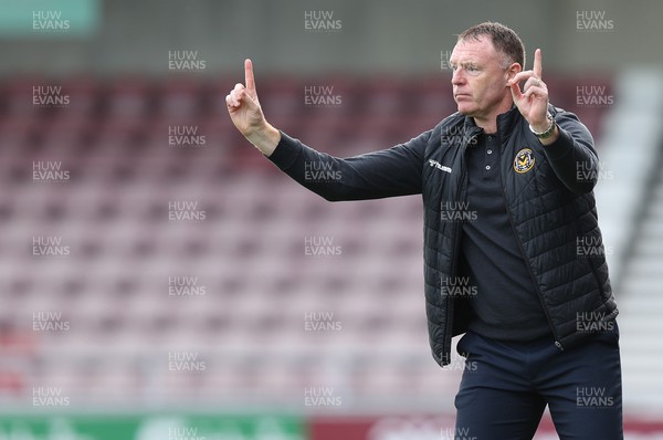 291022 - Northampton Town v Newport County - Sky Bet League 2 - Manager Graham Coughlan of Newport County delays throw in by Mickey Demetriou of Newport County as he gestures to players