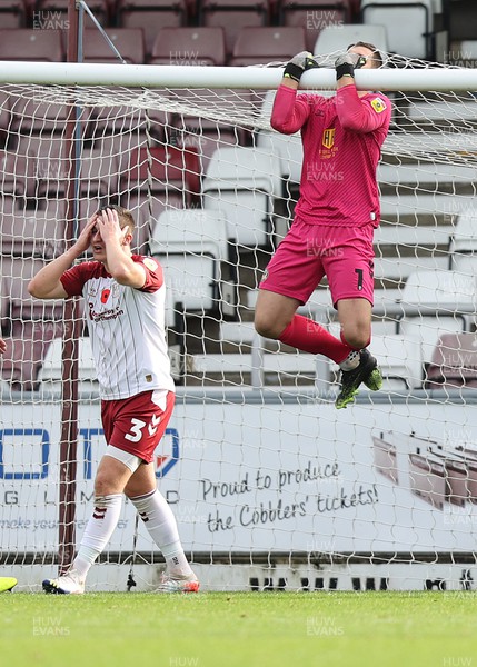 291022 - Northampton Town v Newport County - Sky Bet League 2 - Goalkeeper Joe Day of Newport County swings from the crossbar after saving a shot from Aaron Magloire of Northampton Town in 1st half