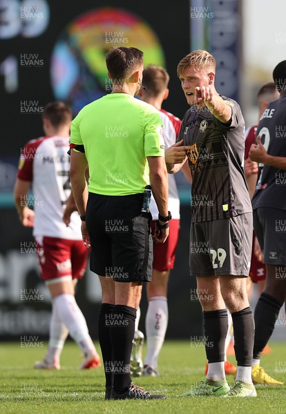 291022 - Northampton Town v Newport County - Sky Bet League 2 - Will Evans of Newport County has words with the referee