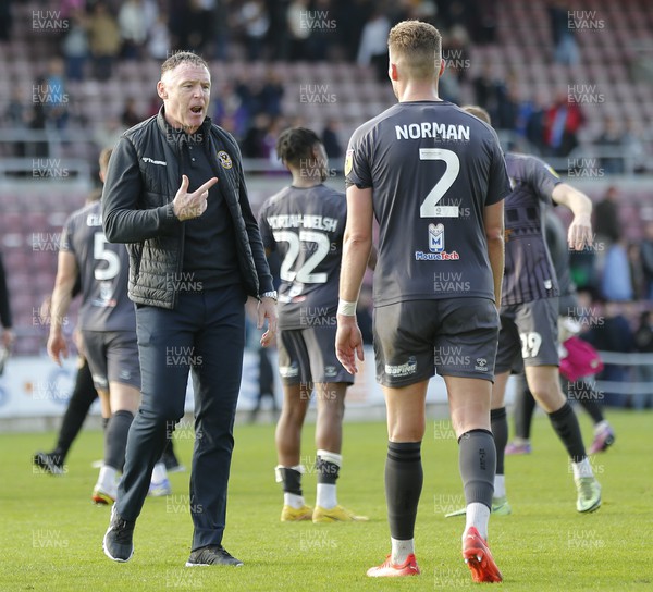 291022 - Northampton Town v Newport County - Sky Bet League 2 - Manager Graham Coughlan of Newport County and Cameron Norman of Newport County at the end of the match