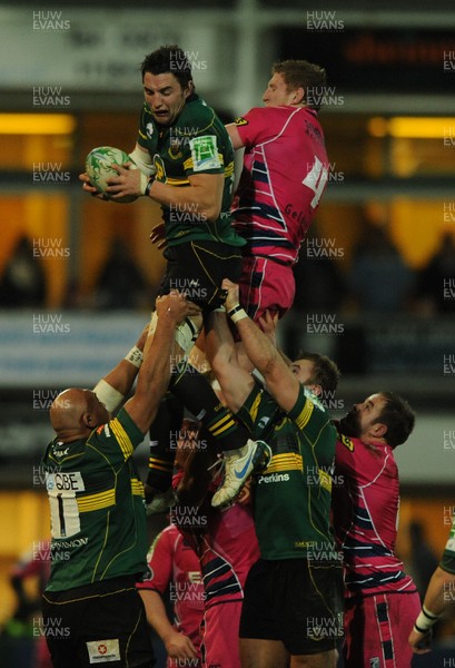 11.12.10 - Northampton Saints v Cardiff Blues - Heineken Cup - Phil Dowson of Northampton and Bradley Davies of Cardiff Blues compete for line-out ball. 