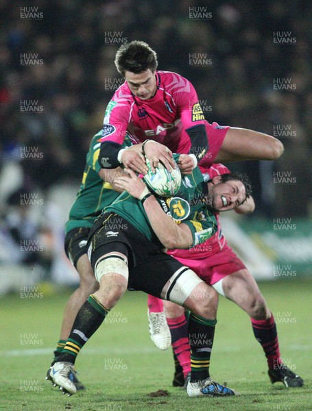 11.12.10....Northampton Saints v Cardiff Blues, Heineken Cup -  Cardiff Blues' Chris Czekaj puts Northampton Saints' Phil Dowson under pressure as he claims the ball 