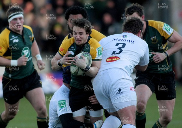 18.12.11 Northampton Saints v Castres  - Heineken Cup - Northampton's Martin Roberts is tackled by Castres' Jam Bornman(L) and Rossouw Kruger(3) 